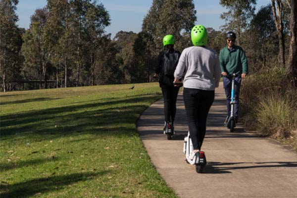 Visitors trialling e-scooters in the Parklands. courtesy of Western Sydney Parklands image: courtesy of Western Sydney Parklands