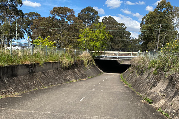 The canal was not filled in where it intersected with road and other infrastructure, creating easy underpasses for shared path users (Image: Bicycle NSW)