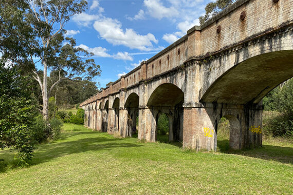 The cycleway crosses the top of the heritage Boothtown Aqueduct, which sits in a tranquil reserve at Greystanes. (Image: Bicycle NSW)