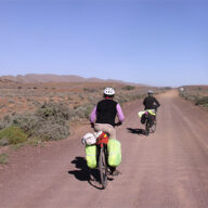 Heavily loaded bikes and a strong headwind! A tough day on the old road from Beltana to Copley (Image: Rosamund Burton)