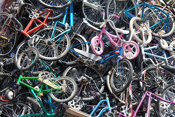 A mountain of bicycles waiting to be recycled.Photo iStock: credit: smkstoll