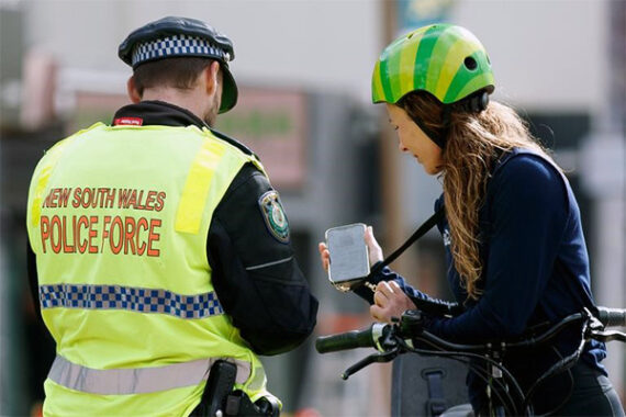 Police charge bike riders for existing